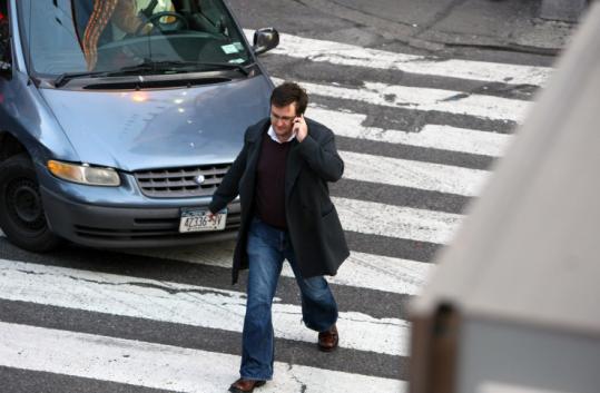 Traffic solution will now be built in Germany to tackle people using smartphones while walking through busy intersections.